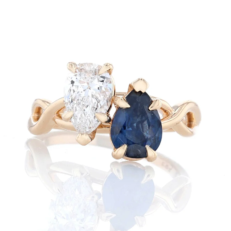 ladies rings surprise-Pear Shaped Sapphire & Diamond Twist Toi Et Moi Ring