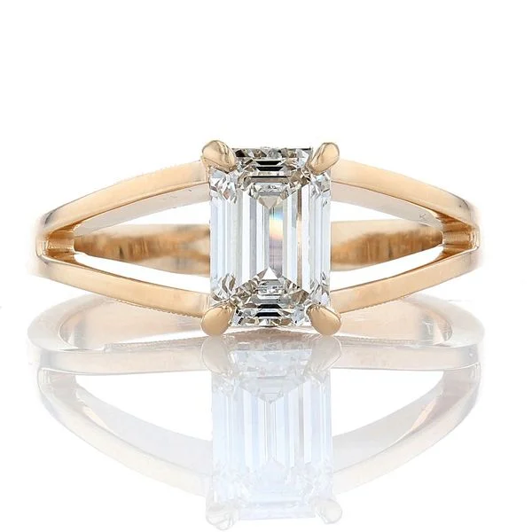 ladies rings surprise-Split Shank Emerald Cut Ring