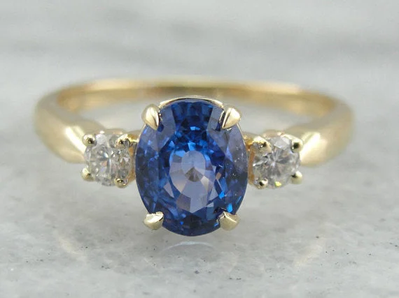 channel set engagement rings -Classic Three Stone Sapphire and Diamond Engagement Ring