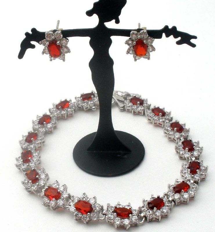 Ladies bracelets with glowing accents -Stauer Red Cubic Zirconia Bracelet & Earrings 925