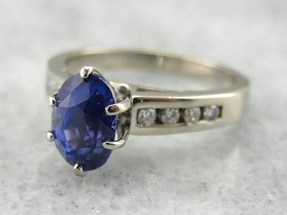 halo engagement rings -Outstanding Blue Sapphire and Diamond Engagement Ring